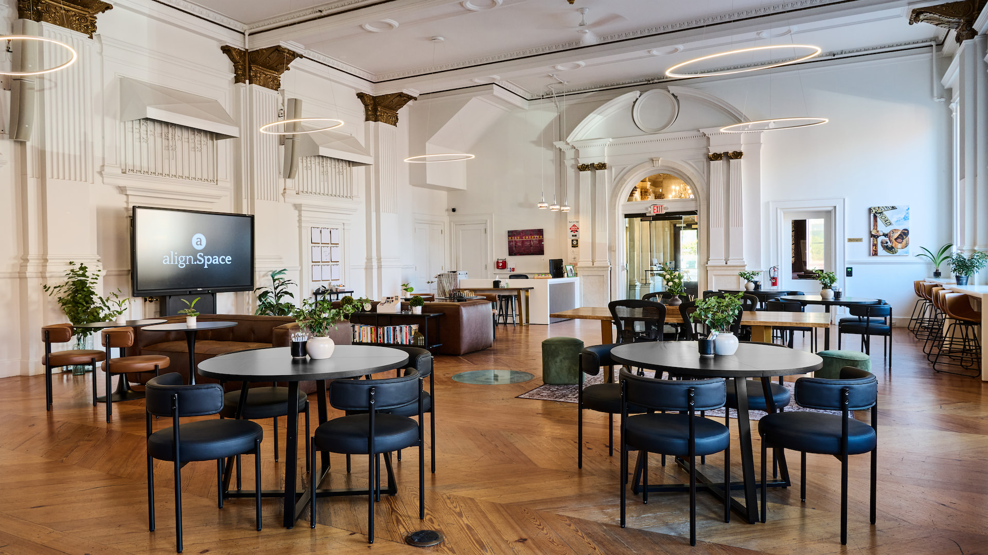 alignspace lobby area with nice tables and decor for coworking